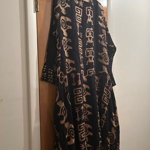 Under the sun black and brown dress with detail on side of bottom